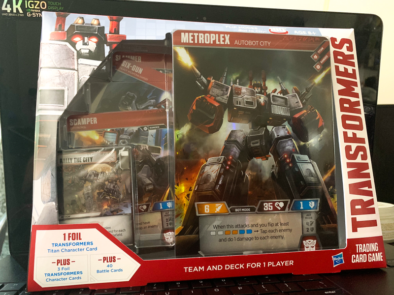 Illustration for article titled The Transformers Trading Card Game's Metroplex Is As Big As My Face